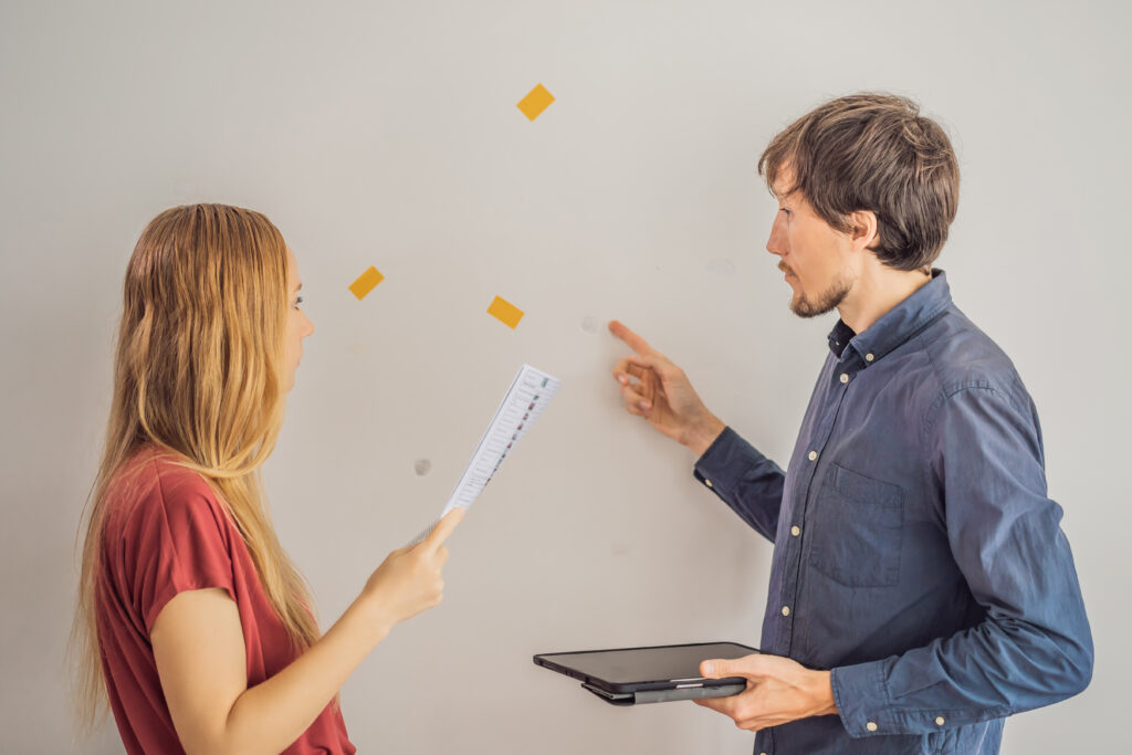 The realtor checks the condition of the apartment when the tenants are about to move out. The walls were damaged, you need to pay for them or deduct part of the money from the deposit.