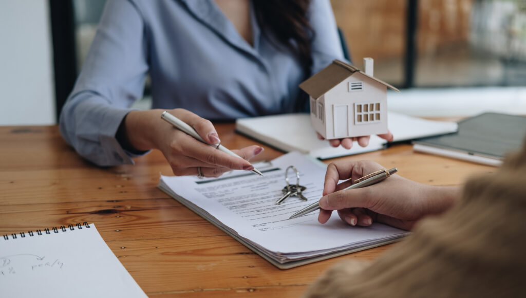 legal consultants, notary or justice lawyer discussing contract document on desk with client customer in courtroom office, business, justice law, insurance, legal service, buy and sell house concept.