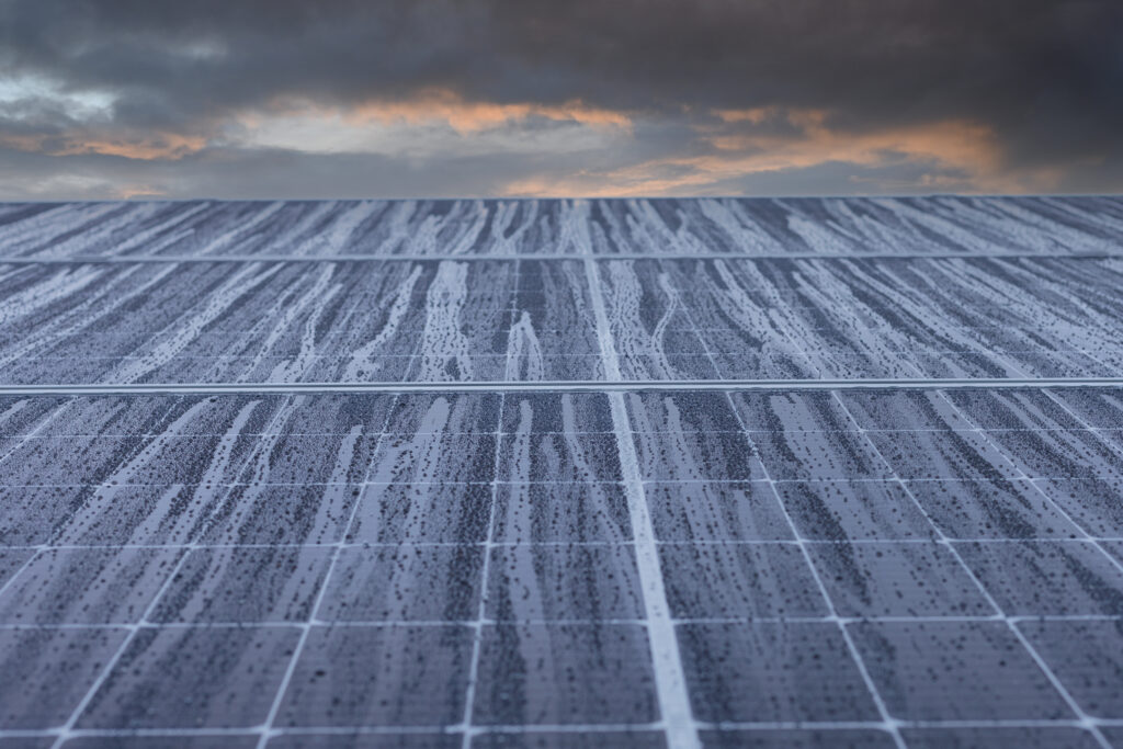 Solar panel with rain drops on it. Solar panel in rain.