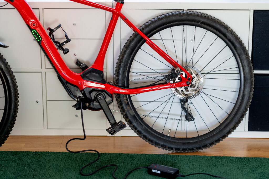 Electric bike charging battery in the house