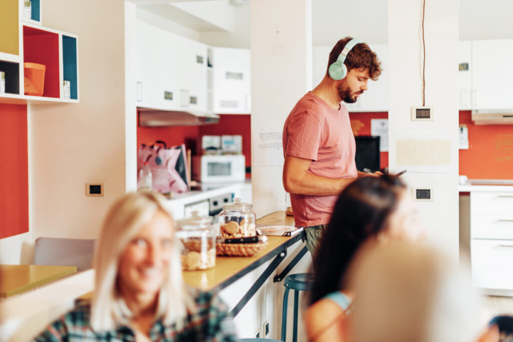 life in a communal kitchen in a youth coliving house