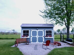 Een tuinhuis plaatsen? Zo leg je de perfecte fundering